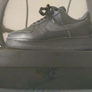 Black air force ones w/ reflective swoosh